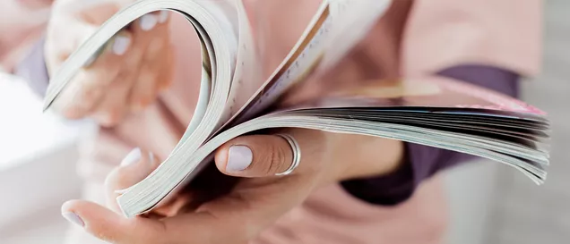 Young Person Reading Booklet