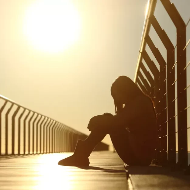 Teenage Girl Sat Alone