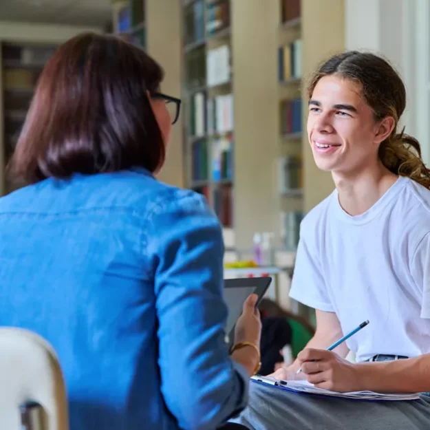 Young Person Meeting With Support Worker